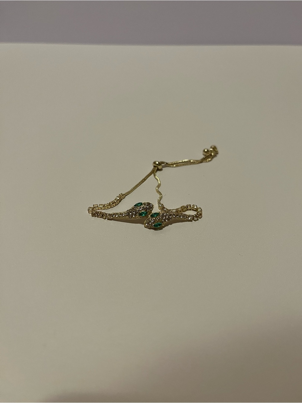 Gold Tennis Bracelet with Green Crystal Accent
